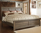 Juararo King Panel Bed with Mirrored Dresser and Chest