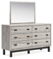 Vessalli Queen Panel Bed with Mirrored Dresser, Chest and Nightstand